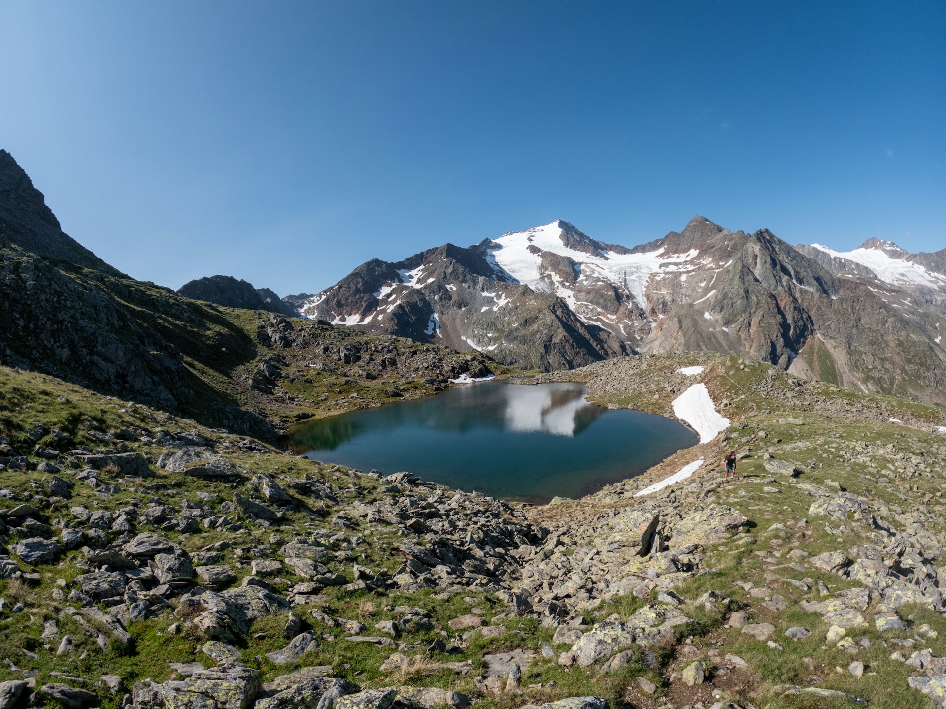 An alpine lake surrounded by the mountains of Tyrol, Austria