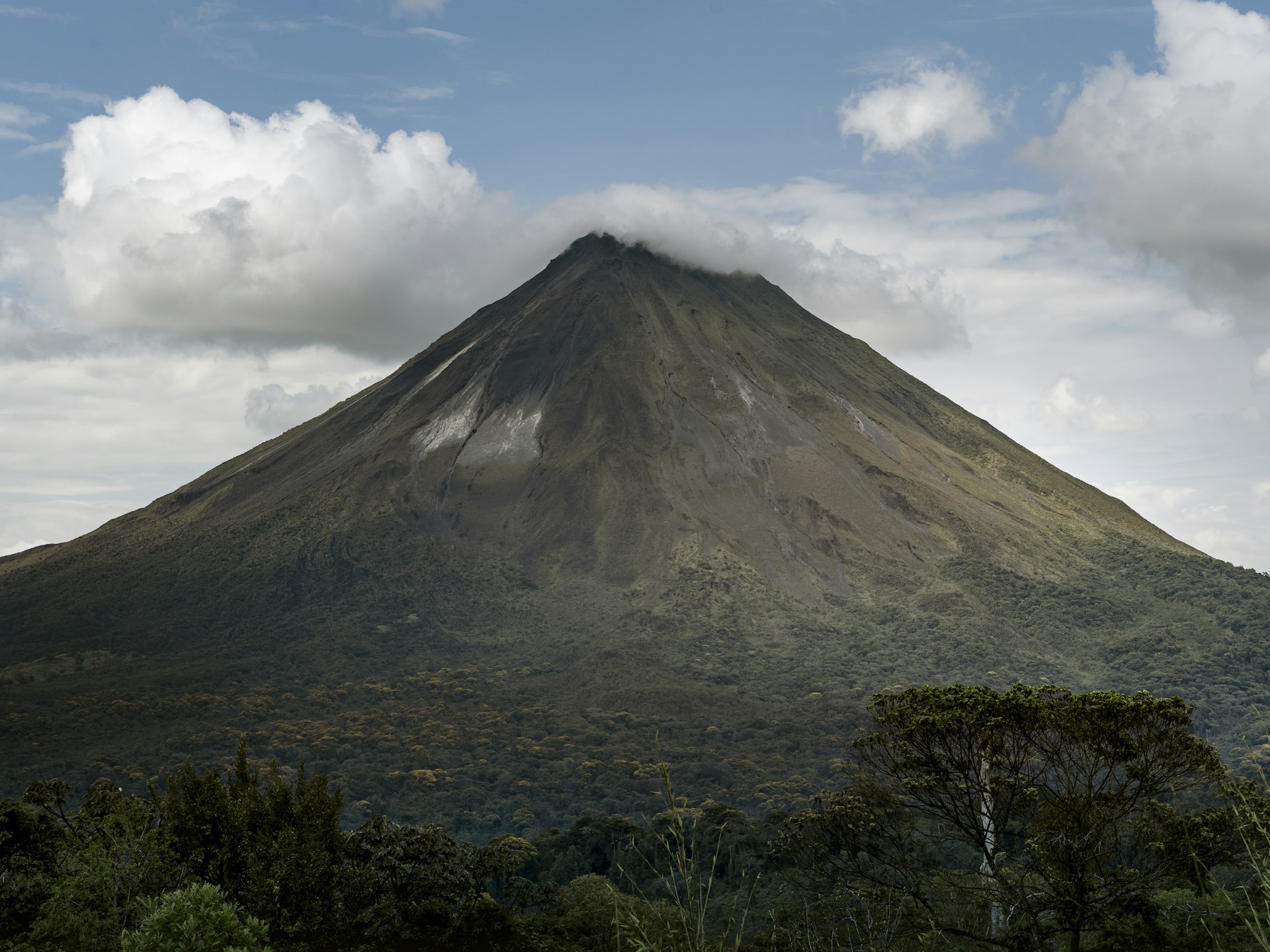 Arenal Volcano rising above the forest in Costa Rica