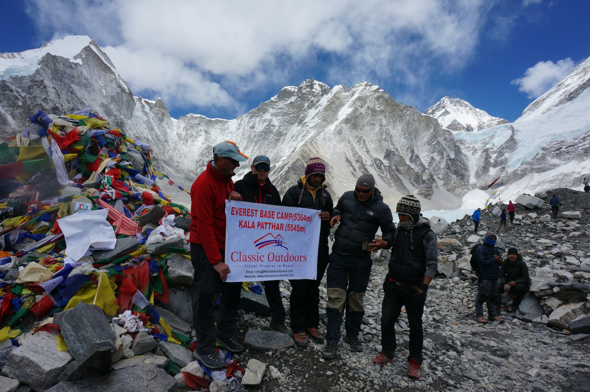 Mountaineers trekking through the high Himalayas of Nepal