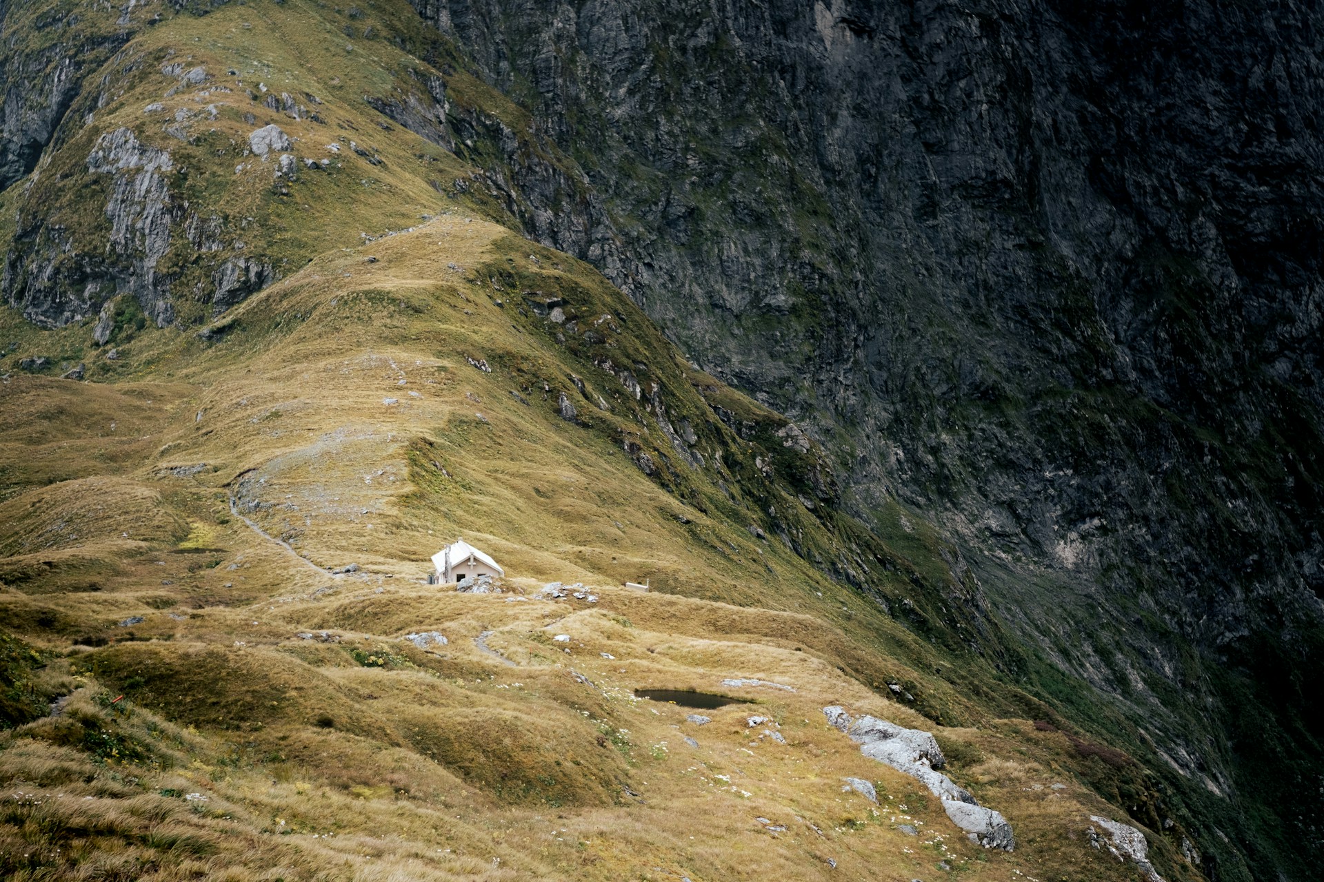 A backcountry hut on a mountain ridge near the Milford Track, New Zealand