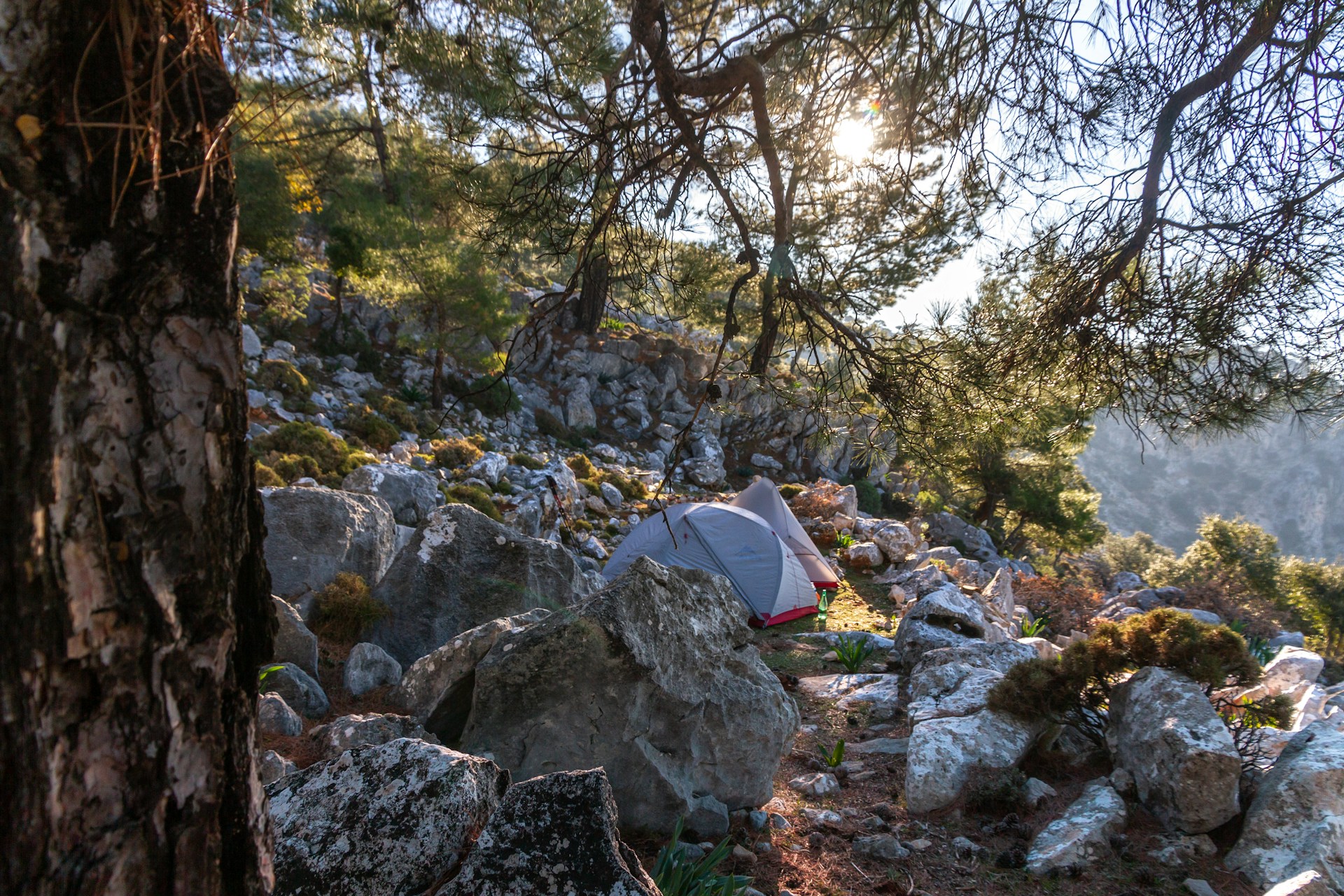 A tent beside a rocky section of the Lycian Way in Turkey