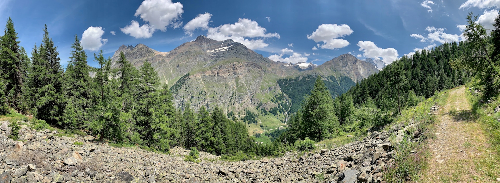 An alpine valley and mountain road in Gran Paradiso National Park