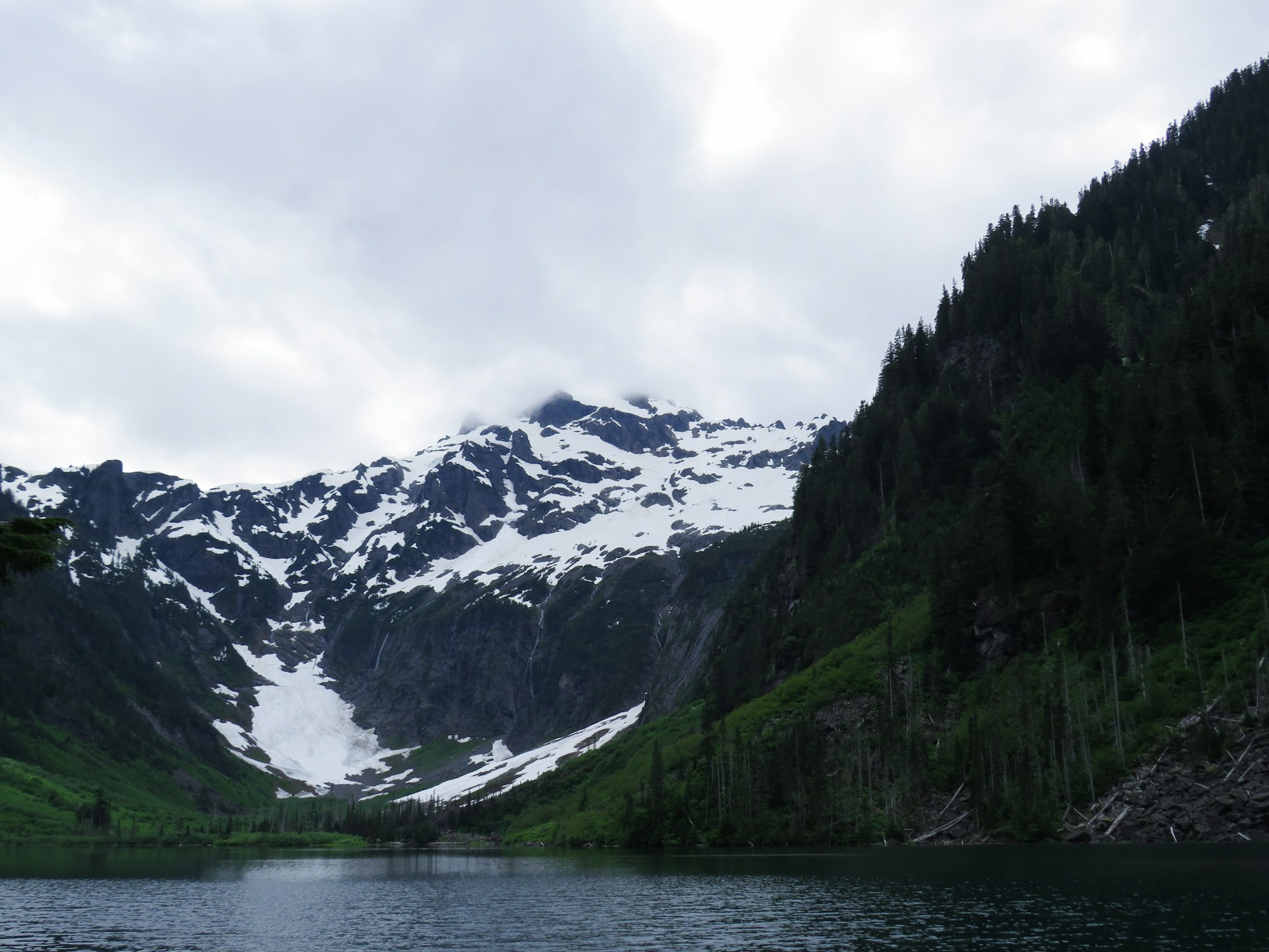 Goat Lake beneath mountain peaks in Washington