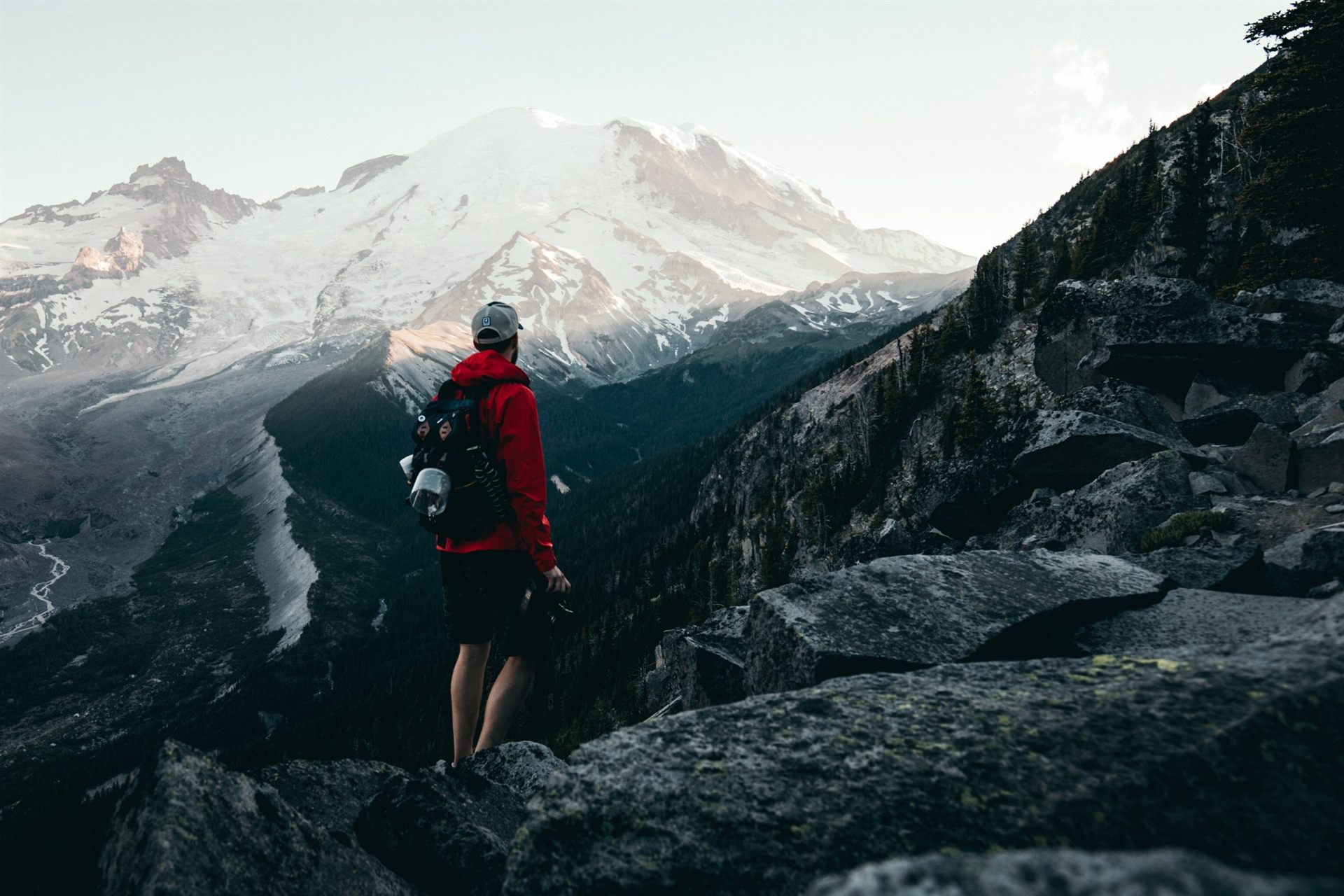 backpacker standing on cliff