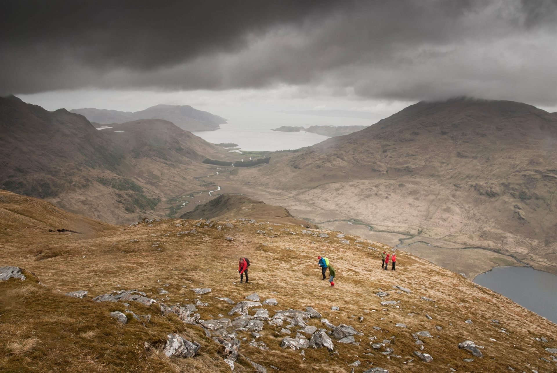 backpackers on mountain peak