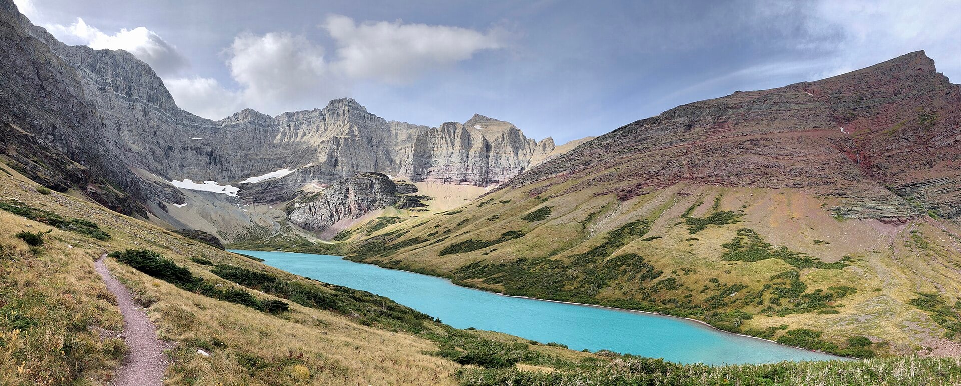 Turquoise Cracker Lake beneath the high peaks of Glacier National Park
