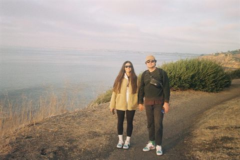 Hikers on a coastal path overlooking the Pacific near Long Beach