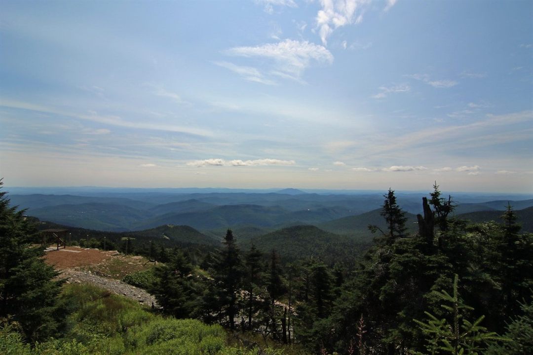 Expansive view across Vermont's forested Green Mountains