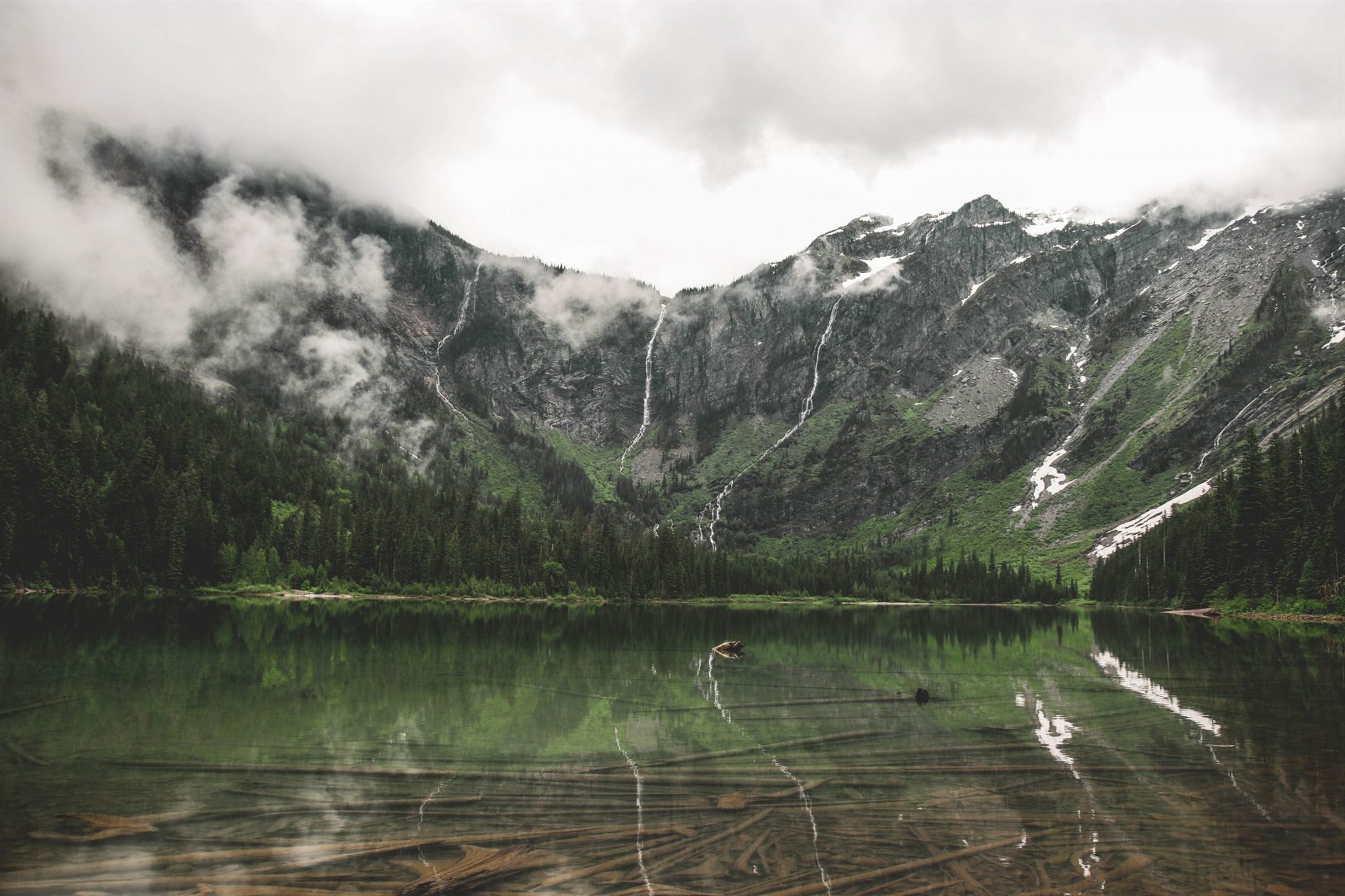 waterfalls and lake in Glacier National Park