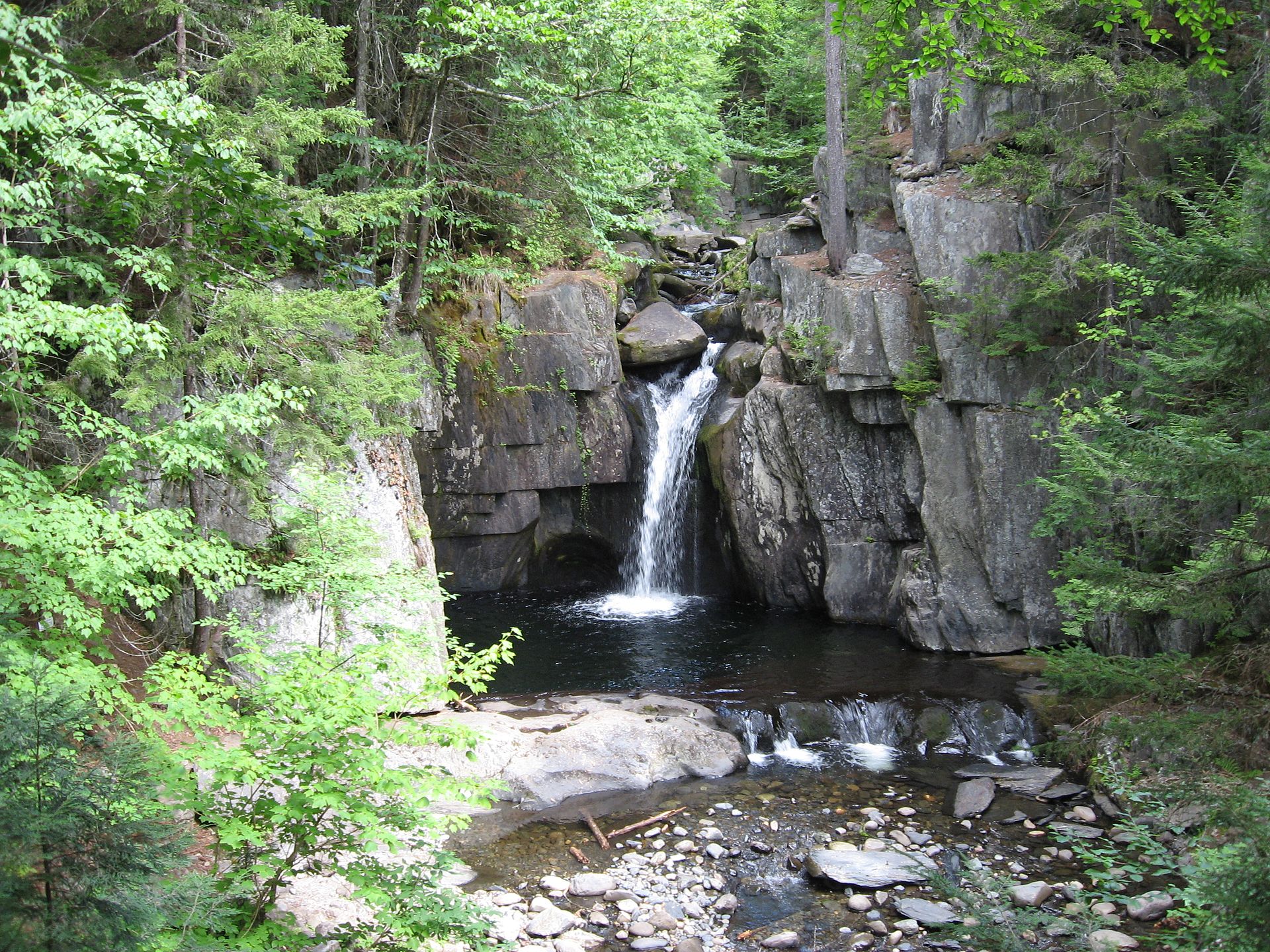 Screw Auger Falls dropping into a pool at Gulf Hagas