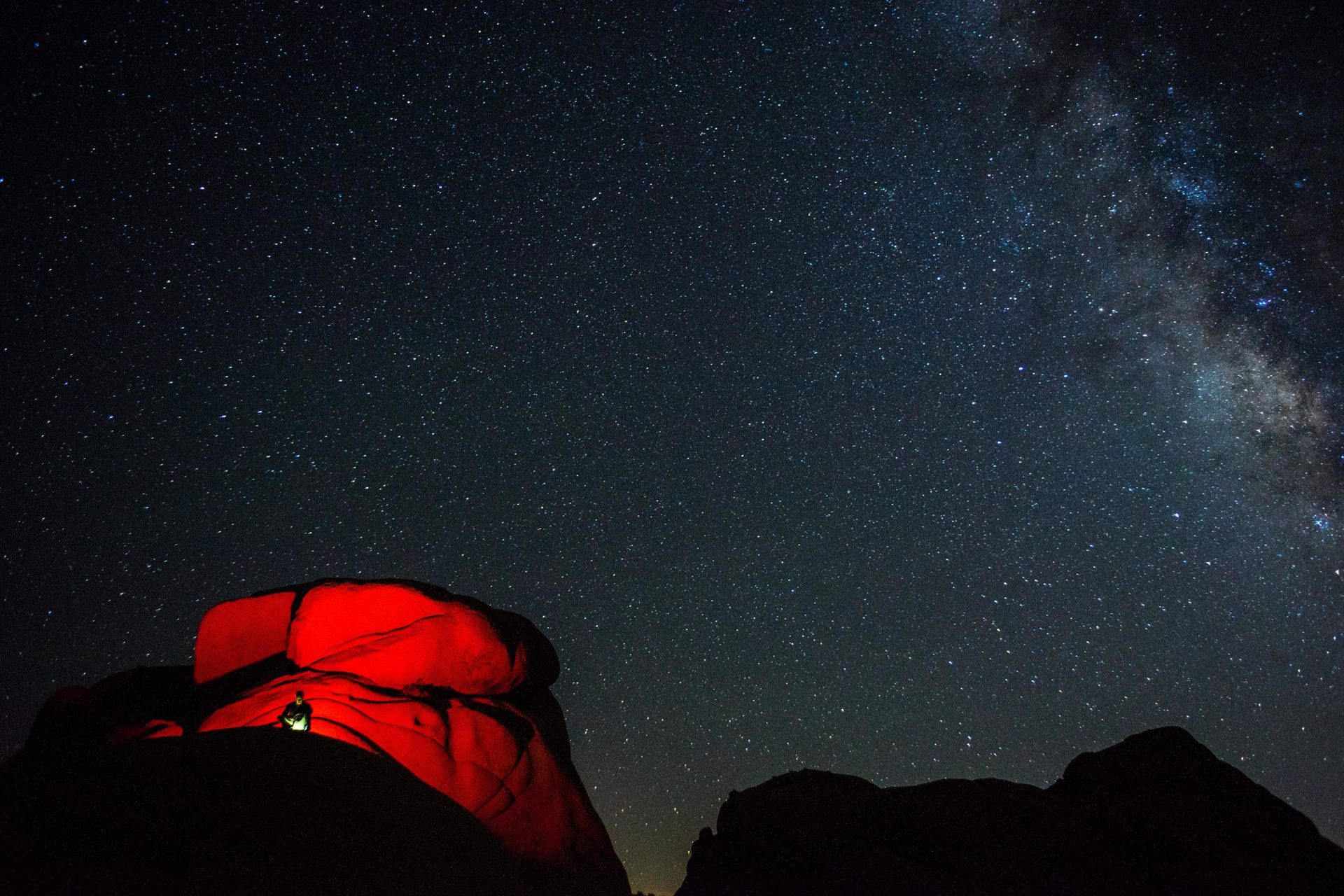 Camping under the night sky