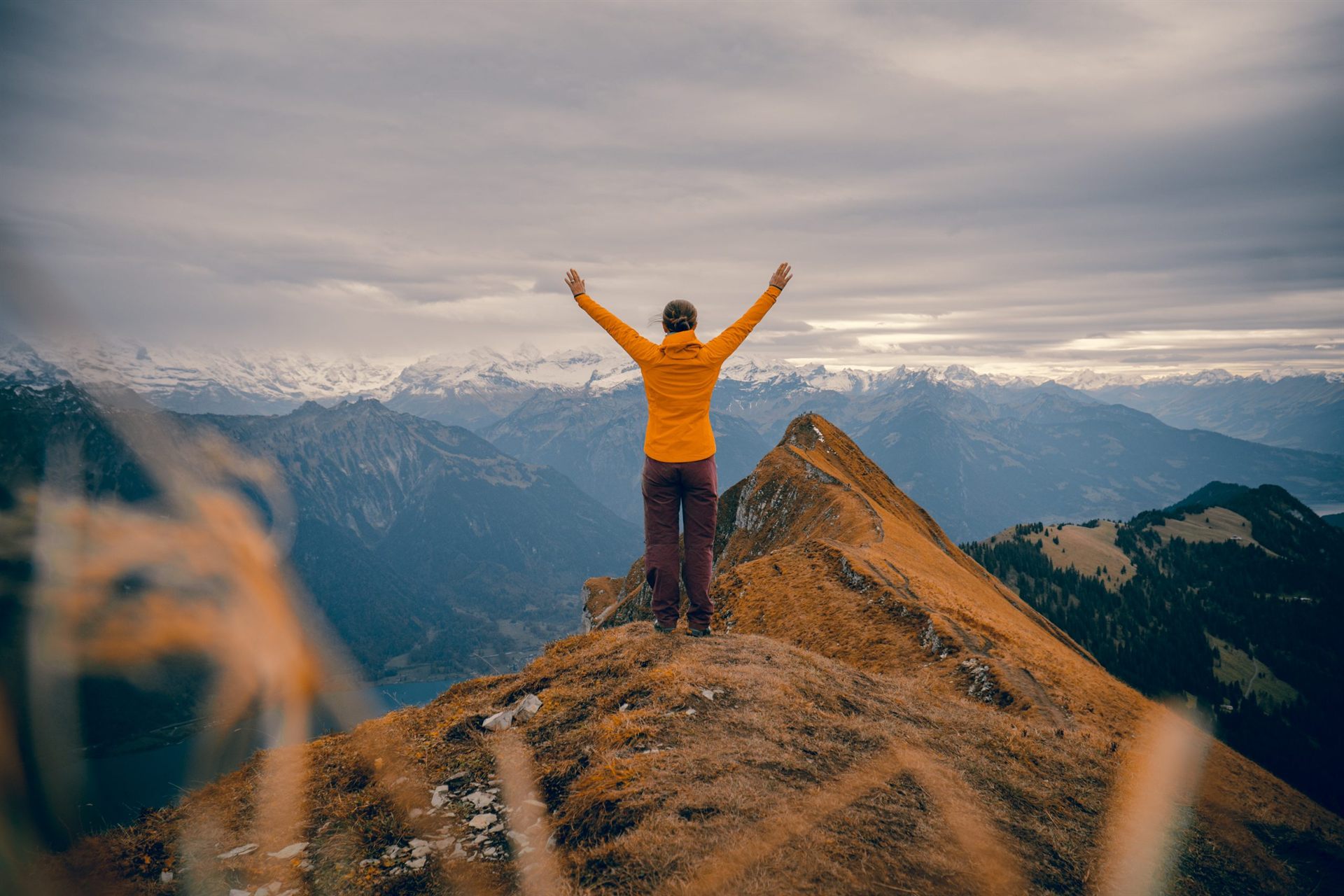 Hiker Standing on Mountain Peak