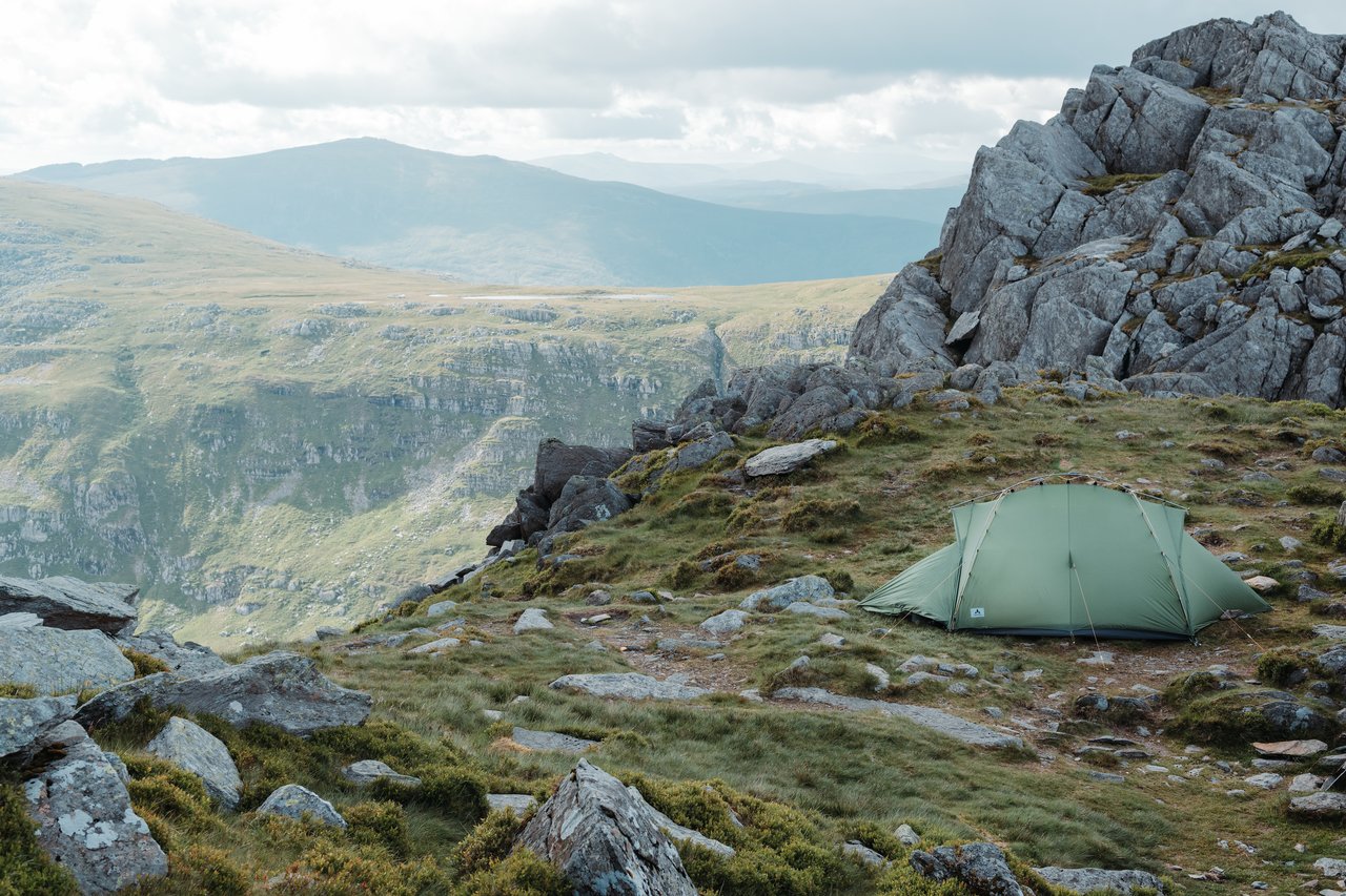 Scrambler Camping on Mountain