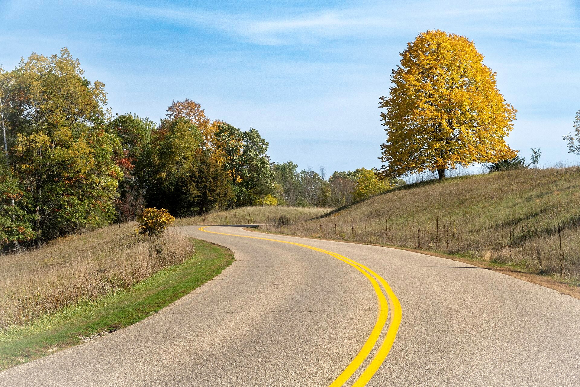 A scenic road through Afton State Park in autumn