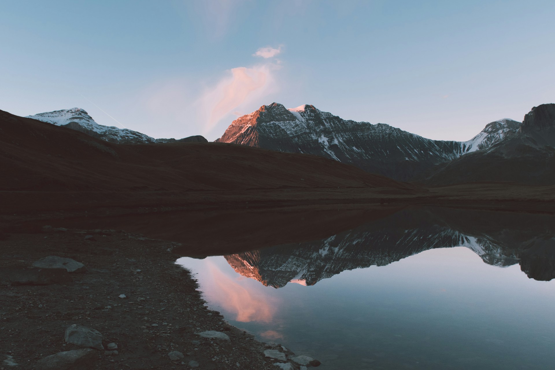 An alpine lake reflecting the mountains of Vanoise National Park