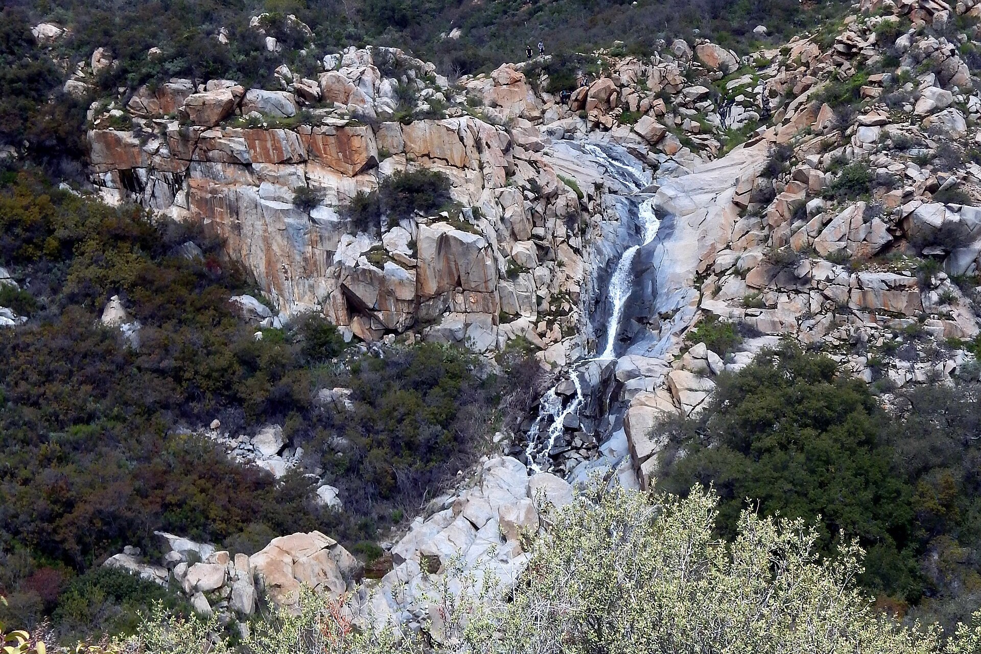 Tenaja Falls flowing over a rocky hillside