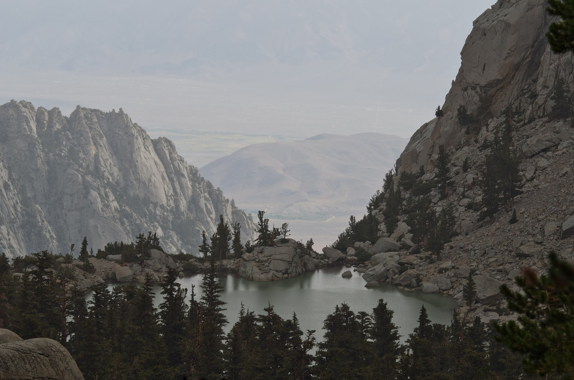 Mount Whitney rising above an alpine lake