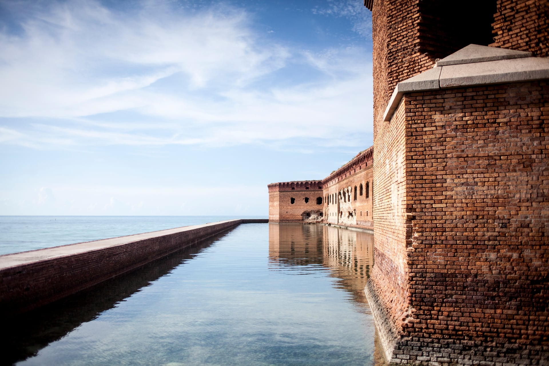 Fort Jefferson and its brick walls beside turquoise water