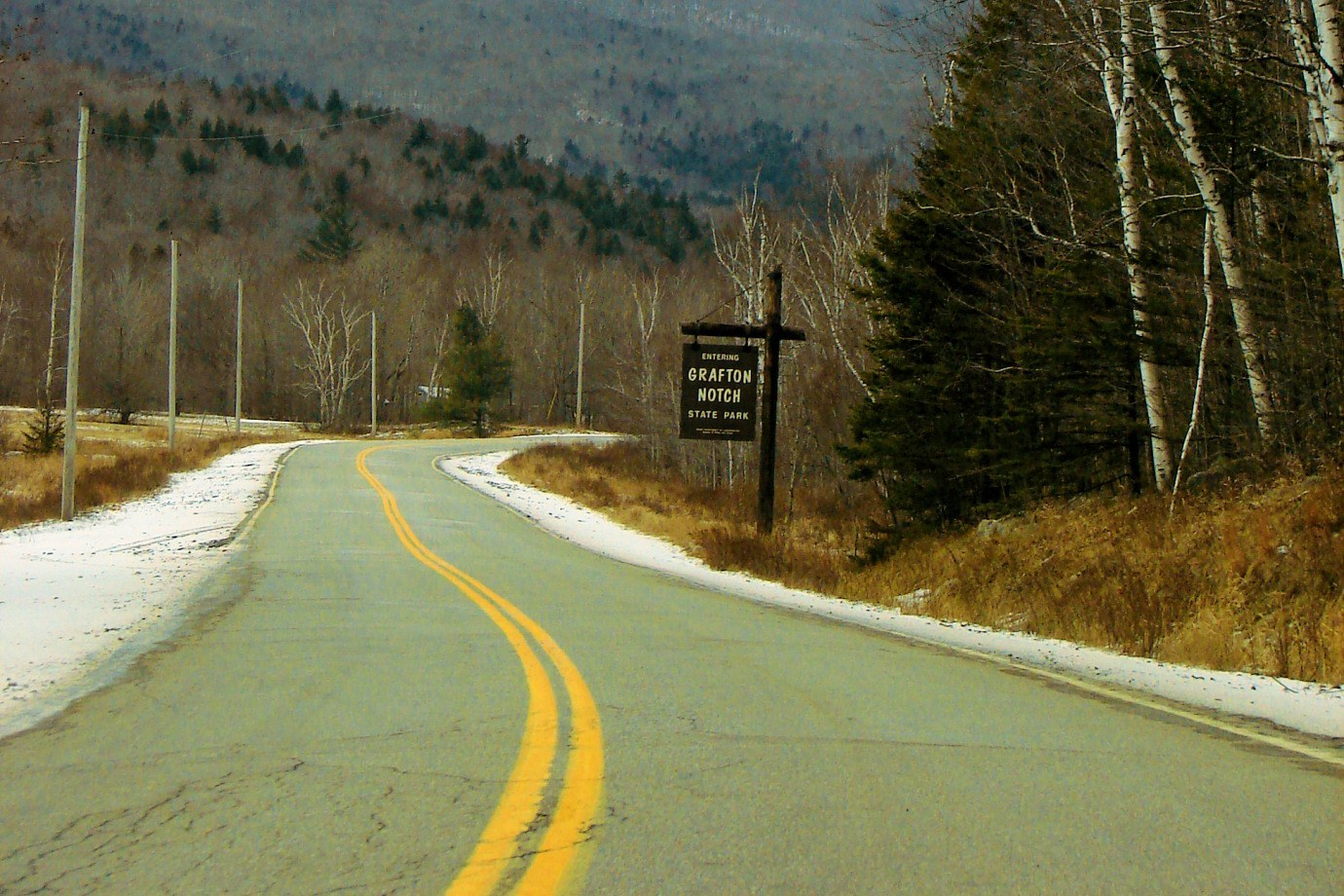 The road entering Grafton Notch with Old Speck Mountain beyond