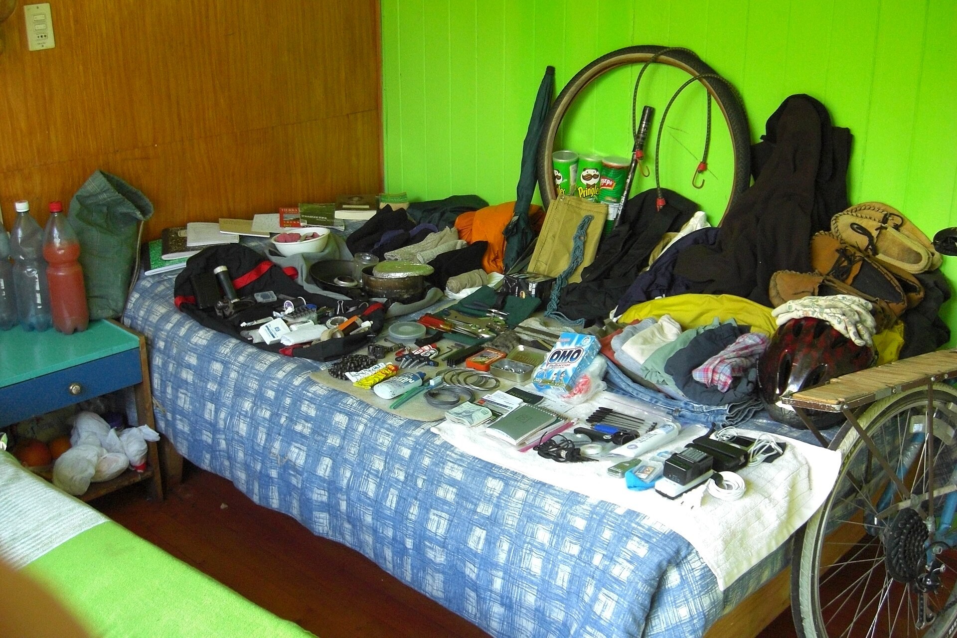 A fully loaded backpacking pack beside a trail