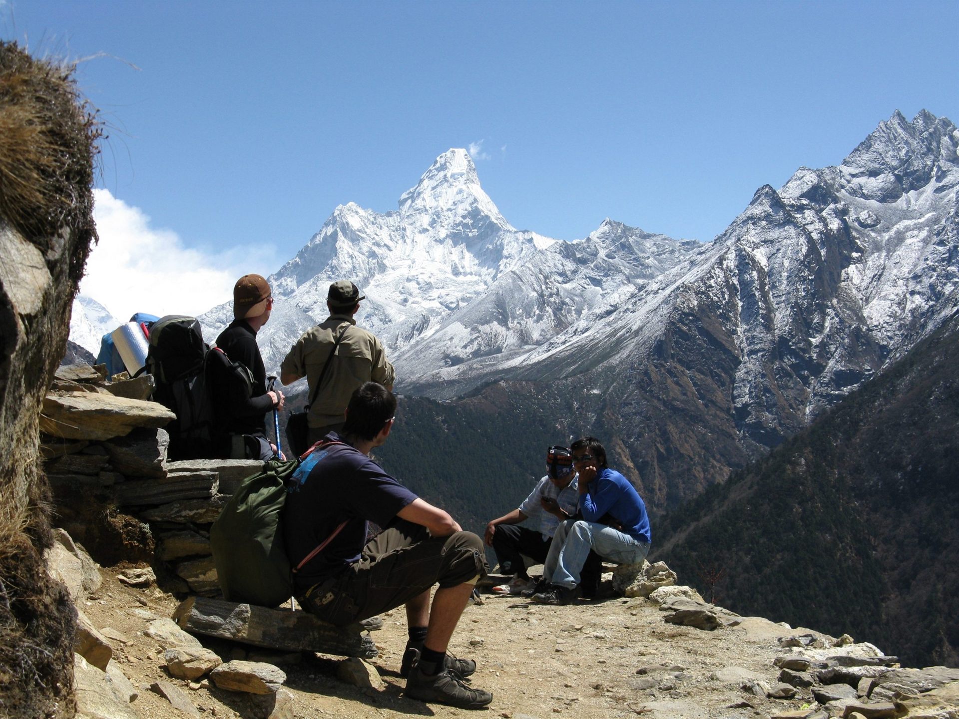 hikers taking a break on the trail following trail etiquette
