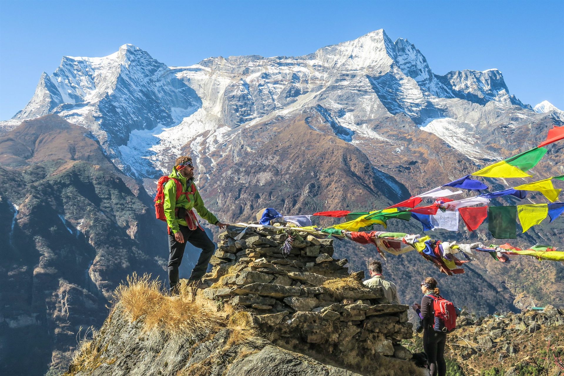 Trekkers in Nepal at Mountain Peak